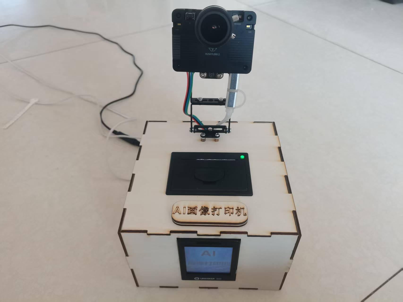 AI画像打印机：基于行空板M10与二哈2的实时人像打印装置